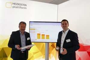  Udo Petzoldt, geschäftsführender Vorstand der Baugenossenschaft Kulmbach eG, und Jan Fredrik Harksen, Geschäftsführer der Zuhause Plattform GmbH, präesentieren die Heizkosten Plattform auf der BAU 2019 in München.  