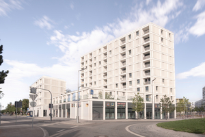  Das neue Ensemble markiert das Zentrum des Quartiers Paul-Gerhardt-Allee. Während die Nahversorgung im Erdgeschoss untergebracht ist, wurden die Wohnhäuser auf dem Sockelgeschoss platziert  