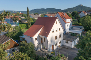  Energetisch optimiertes Satteldach mit eingebundener Schleppgaube 