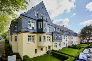  Blick auf die schieferverkleidete Stirnseite des Eckhauses an der Kreuzung Erbhof/Margaretenstraße mit ihren rosettenartigen Ornamenten 