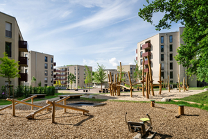  Der Krügelpark ist auf das Zusammenleben unterschiedlicher Generationen ausgelegt: Neben Senior*innen-WGs finden sich so auch zwei Spielplätze und eine Kita 