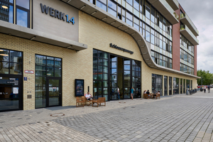  Außenansicht des Werk 1.4, das Büros, Co-Working und Co-Living Spaces beherbergt 