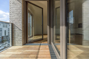  Langlebige und moderne Oberflächen prägen die Innenräume des Wohnquartiers. Im Systemaufbau mit CreaGlas Glasvlies VG 1000 kam Superlux 3000 für ein hochwertiges Oberflächenfinish zum Einsatz 