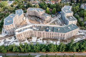  Im Karlsruher Stadtteil Daxlanden ist auf 80.000 Quadratmetern ein modernes Wohnquartier mit 357 Wohneinheiten, Gewerbeeinheiten und einer Kindertagesstätte entstanden 