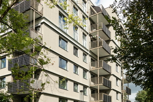  Die horizontale Gliederung der neuen Fassade offenbart die Schnittstelle zwischen Alt- und Neubau bzw. der Aufstockung 