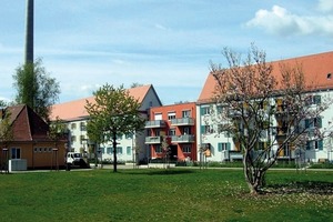  Die Fassade des GEWOFAG-Gebäudes in München bei Nacht 