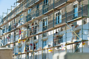  Beim Neubau der Kölner Siedlung am Buchheimer Weg ließ die GAG 15.000 m² Fassadenflächen mit Polystyrolplatten dämmen. Ergänzend wählte man einen dickschichtigen, mineralischen Putzaufbau 