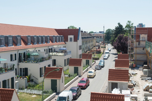  Allen Wohnungen der rund 100 Jahre alten Siedlung wird ein Freiraum in Form eines Gartens, einer Terrasse oder eines Balkons zugeordnet 