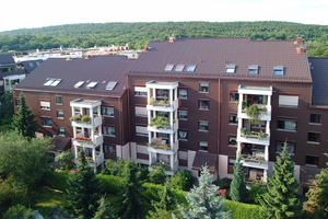  Die Dächer dieser Wohnanlage der Stuttgarter WEG im Stadtteil Weilimdorf  wurden mit einer Kombinationsdämmung von Bauder saniert (U-Wert 0,13) 