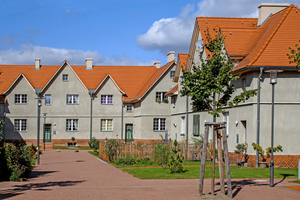  Mit wechselnden Giebeln und Gauben strukturierte Reihenhäuser verleihen der Preußensiedlung eine einzigartige Architektur, die auch nach der Sanierung erhalten blieb 